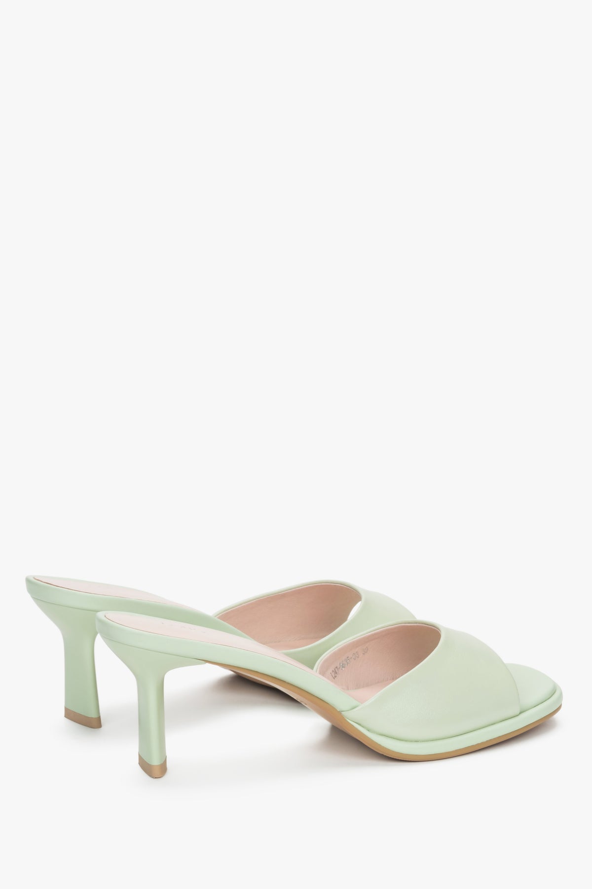 Made of genuine leather, light green women’s heeled mules Estro.