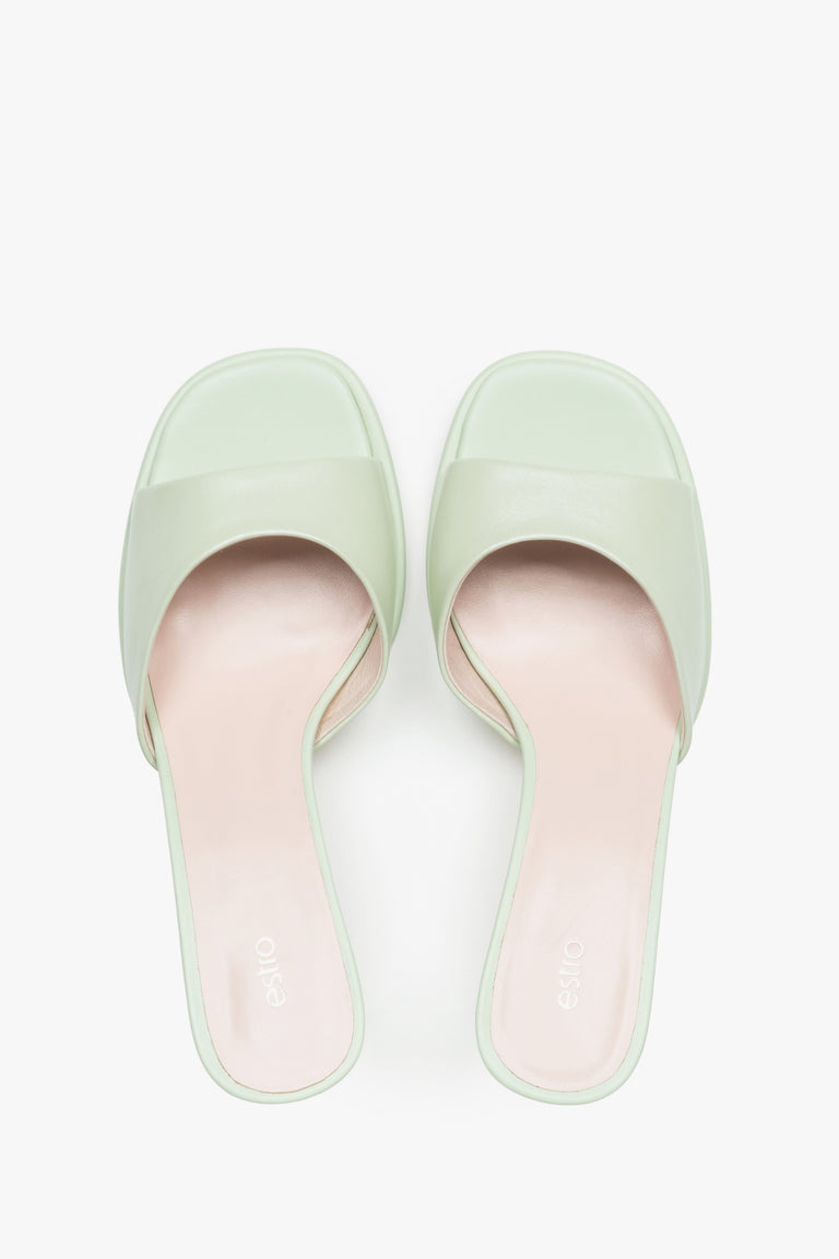 Made of genuine leather, light green women’s heeled mules Estro.