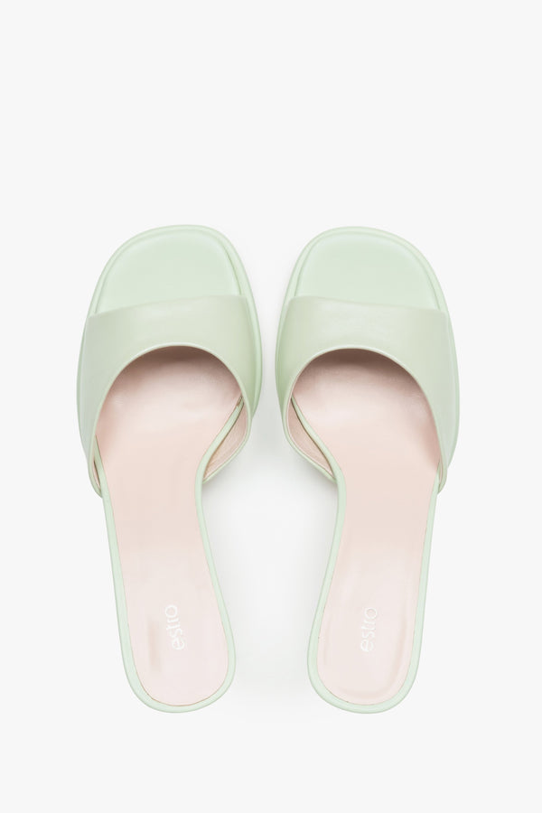 Made of genuine leather, light green women’s heeled mules Estro.