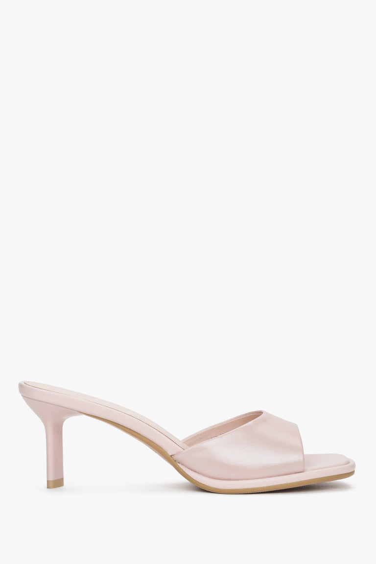 Light pink women’s heeled leather mules.