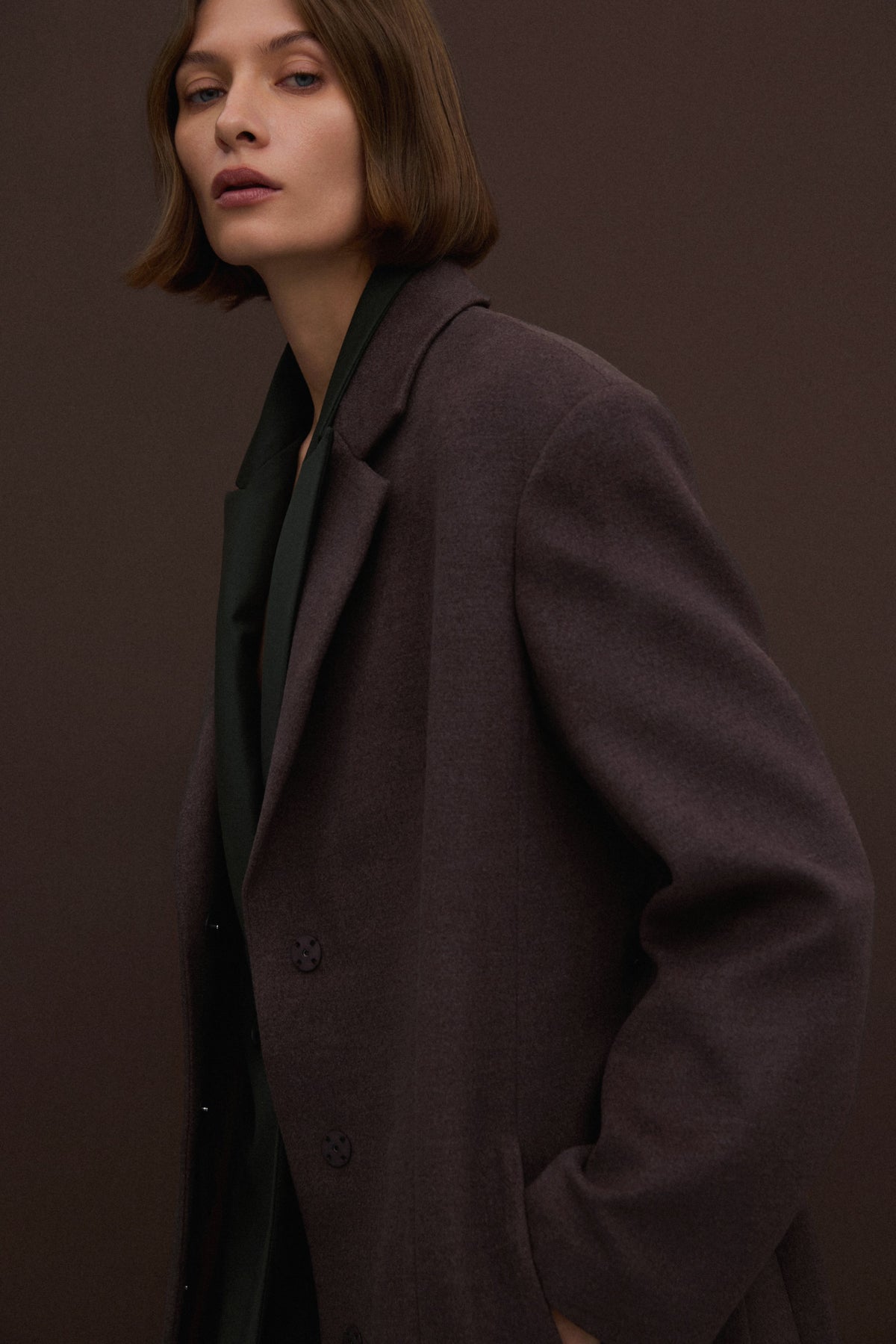 Belted long brown women’s coat in a classic cut Estro ER00117926.