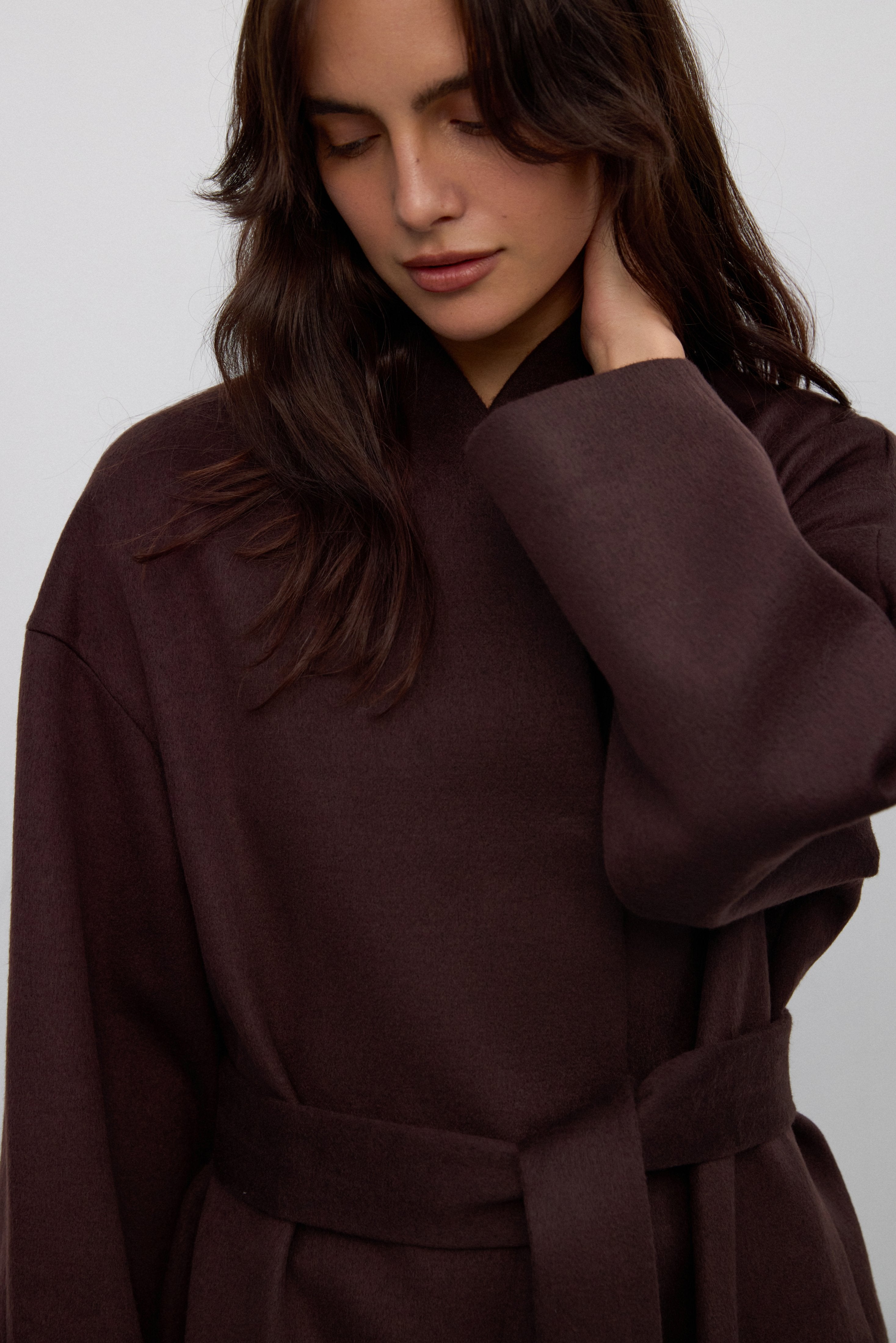 Long lightweight coat in dark brown tied at the waist.