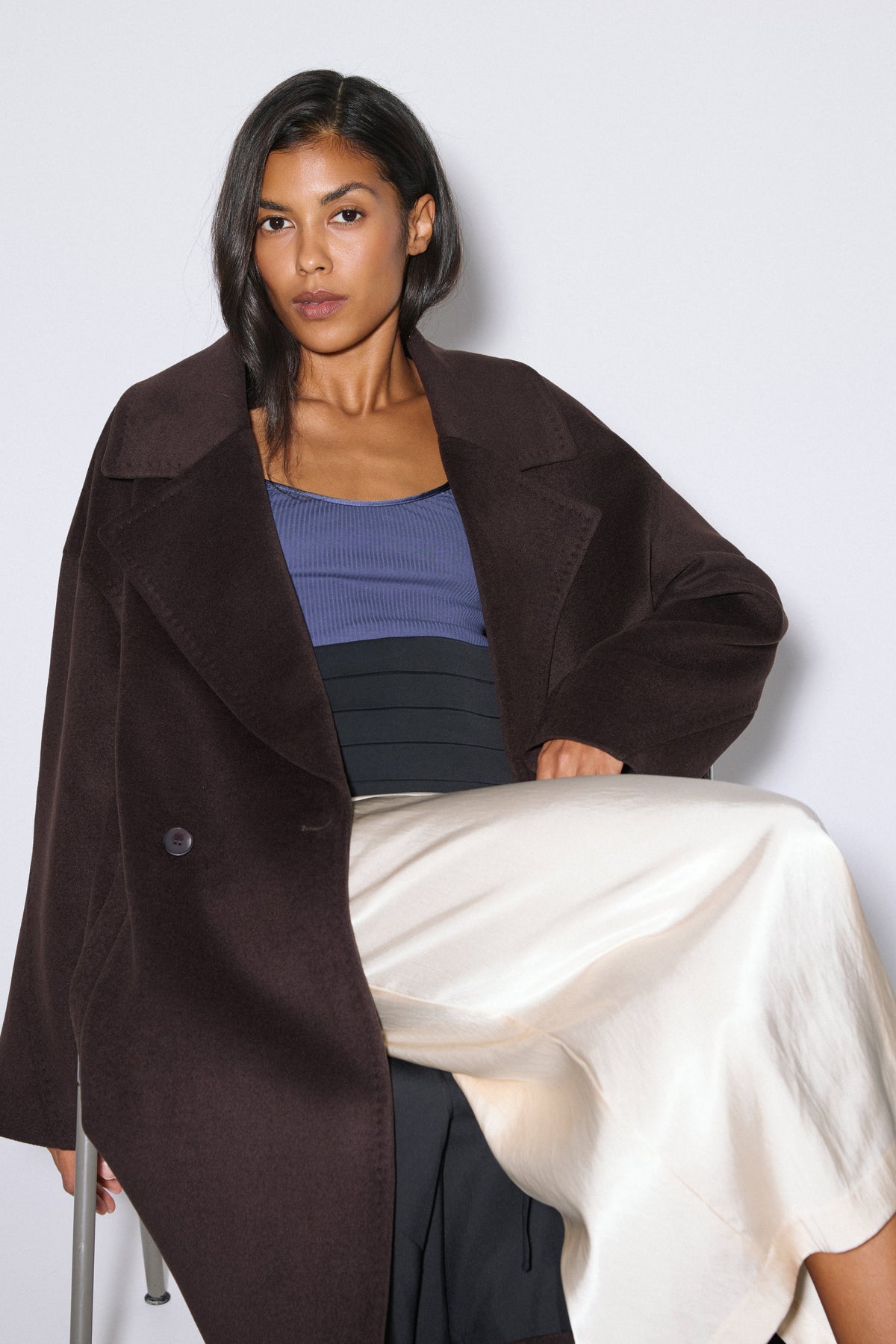 Women's dark brown long wool coat Estro - front view showing the belted waist and prominent wide lapels.