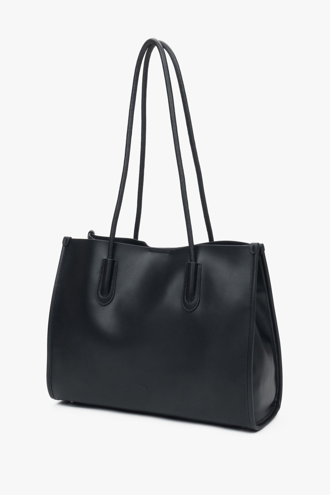 Black leather shopper bag by Estro with long handles, comfortable for everyday shoulder wear.