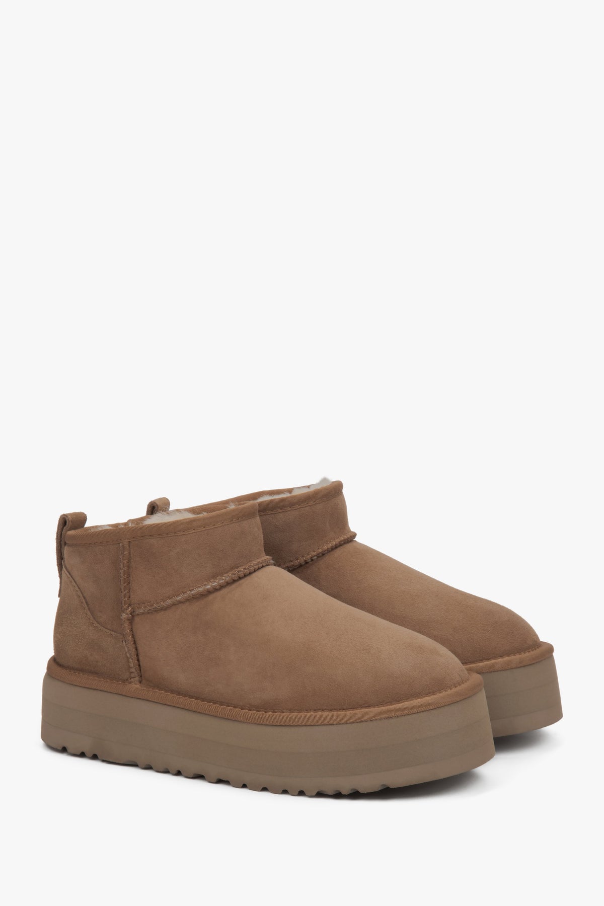 Low beige women's snow boots made of genuine velour with fur.