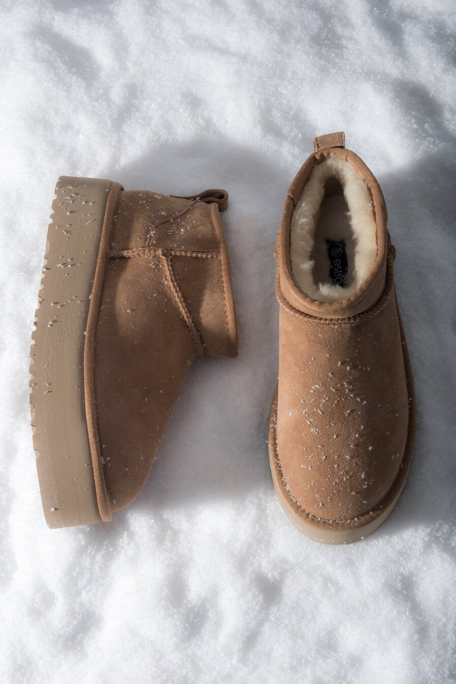 Low beige women's snow boots made of genuine velour with fur.