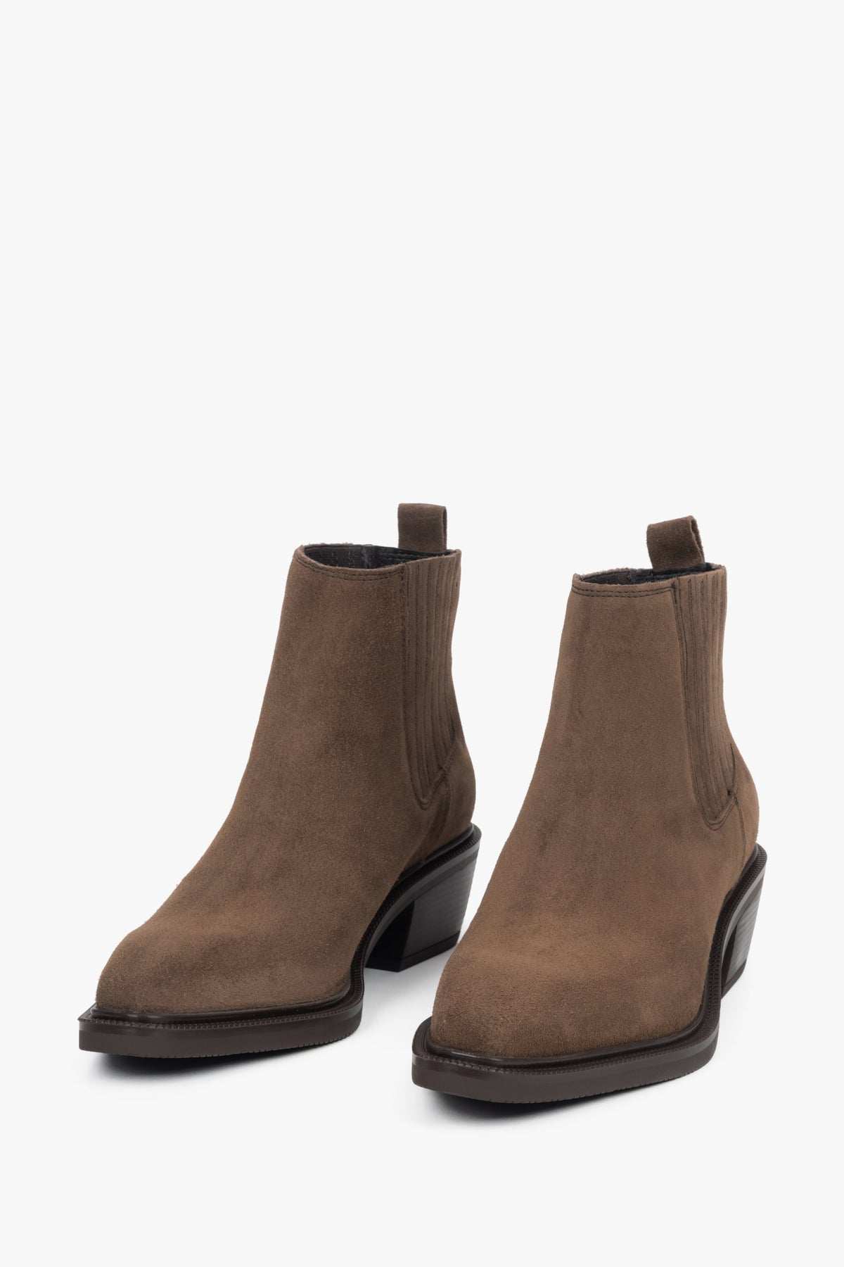 Women’s brown cowboy boots by Estro, crafted from soft velour and finished with a signature angled heel.