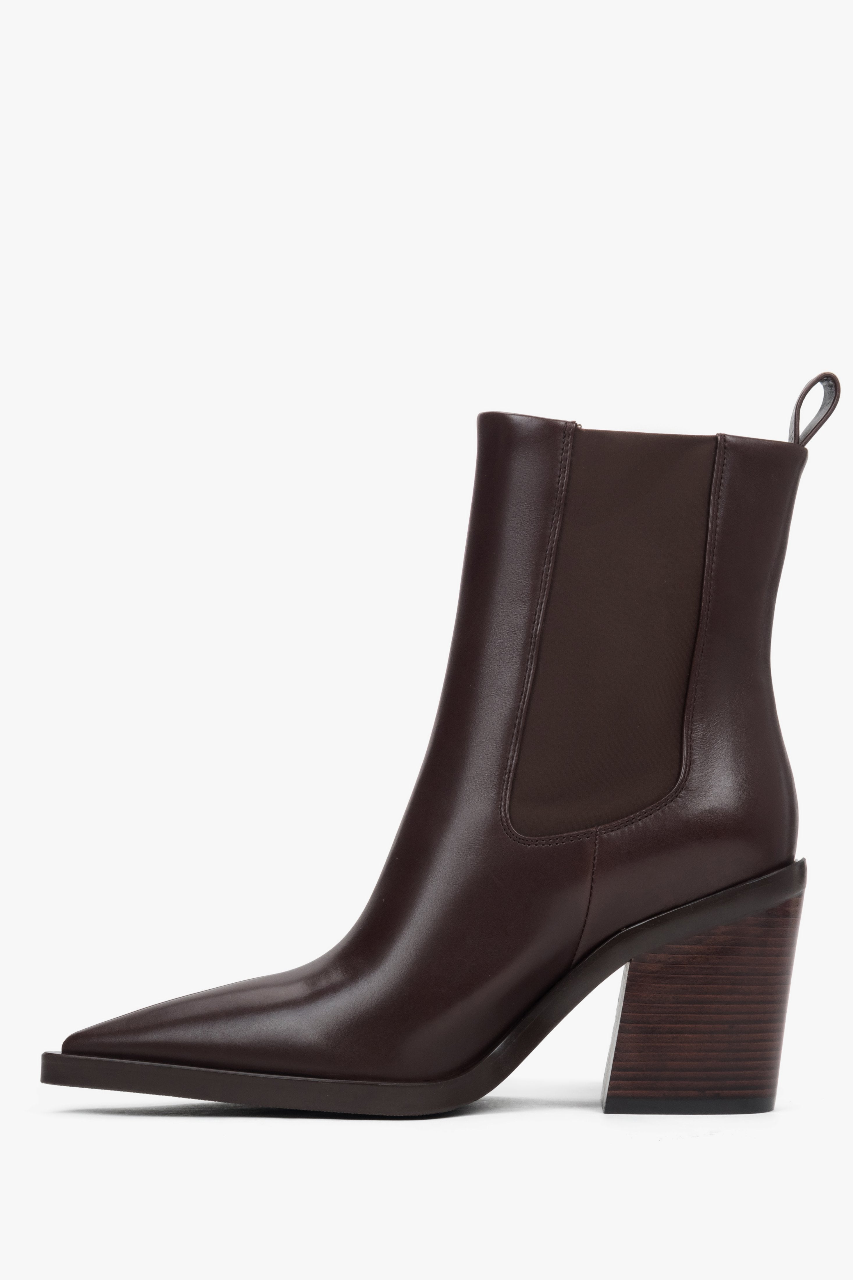 Dark brown women's cowboy boots with a block heel and pointed toe.