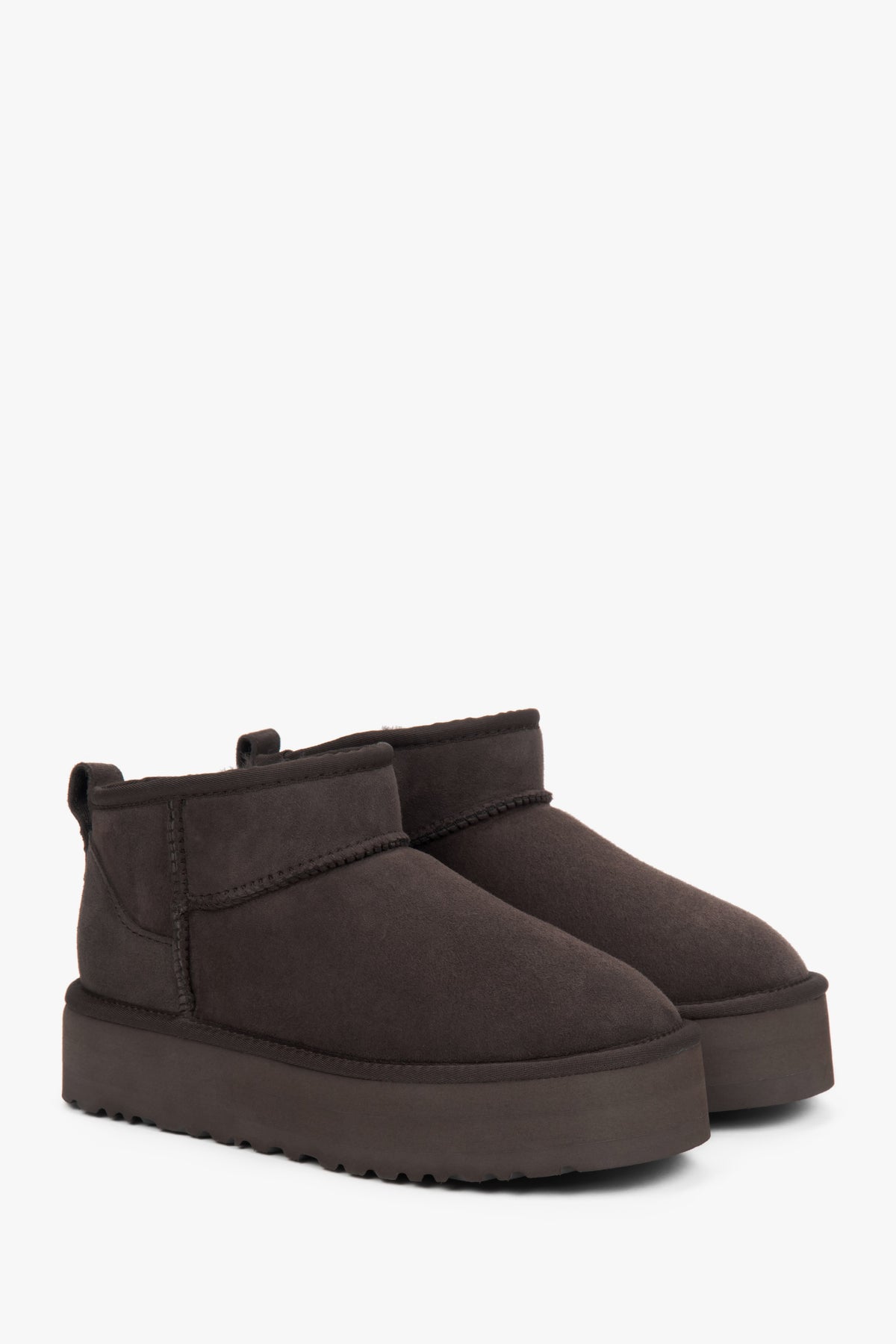 Low brown women's snow boots made of genuine velour with fur.
