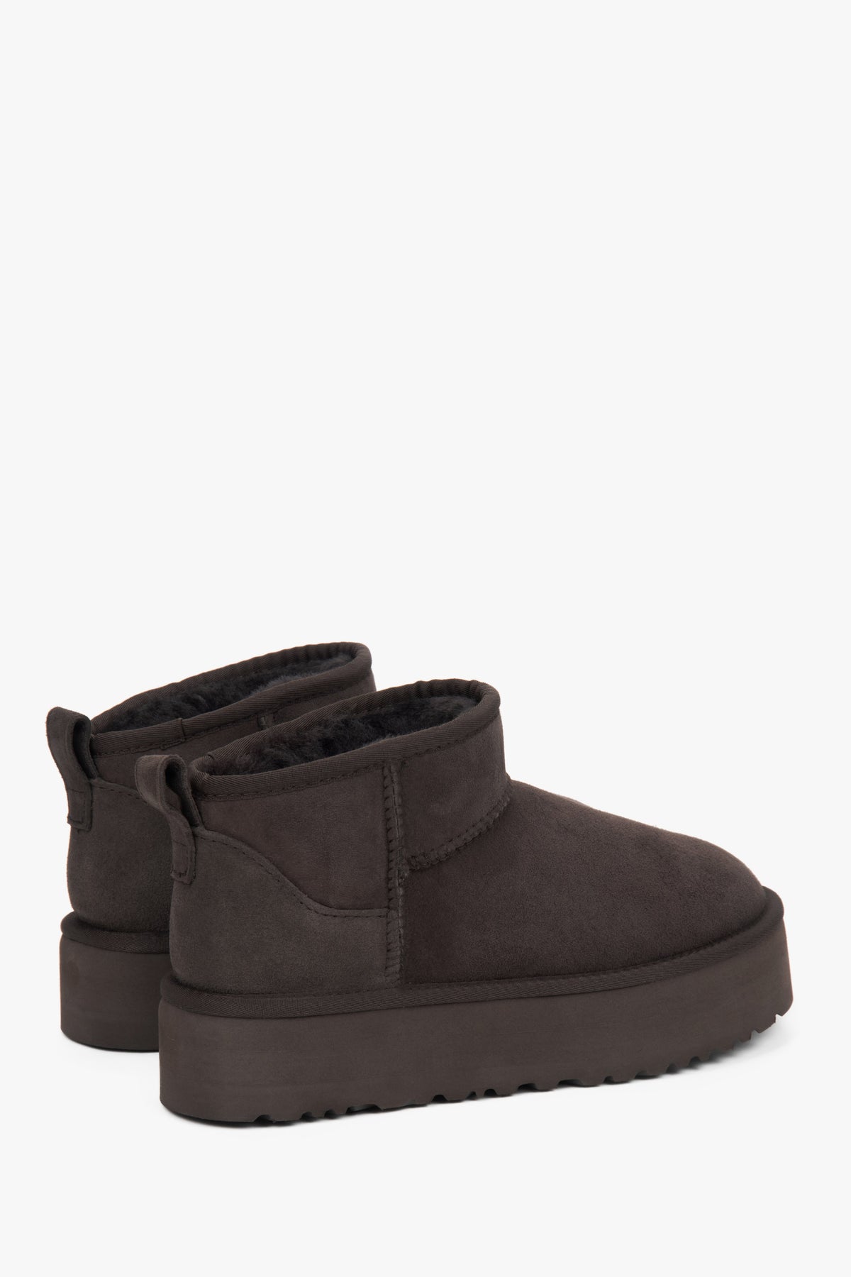Brown low velour snow boots by Estro.