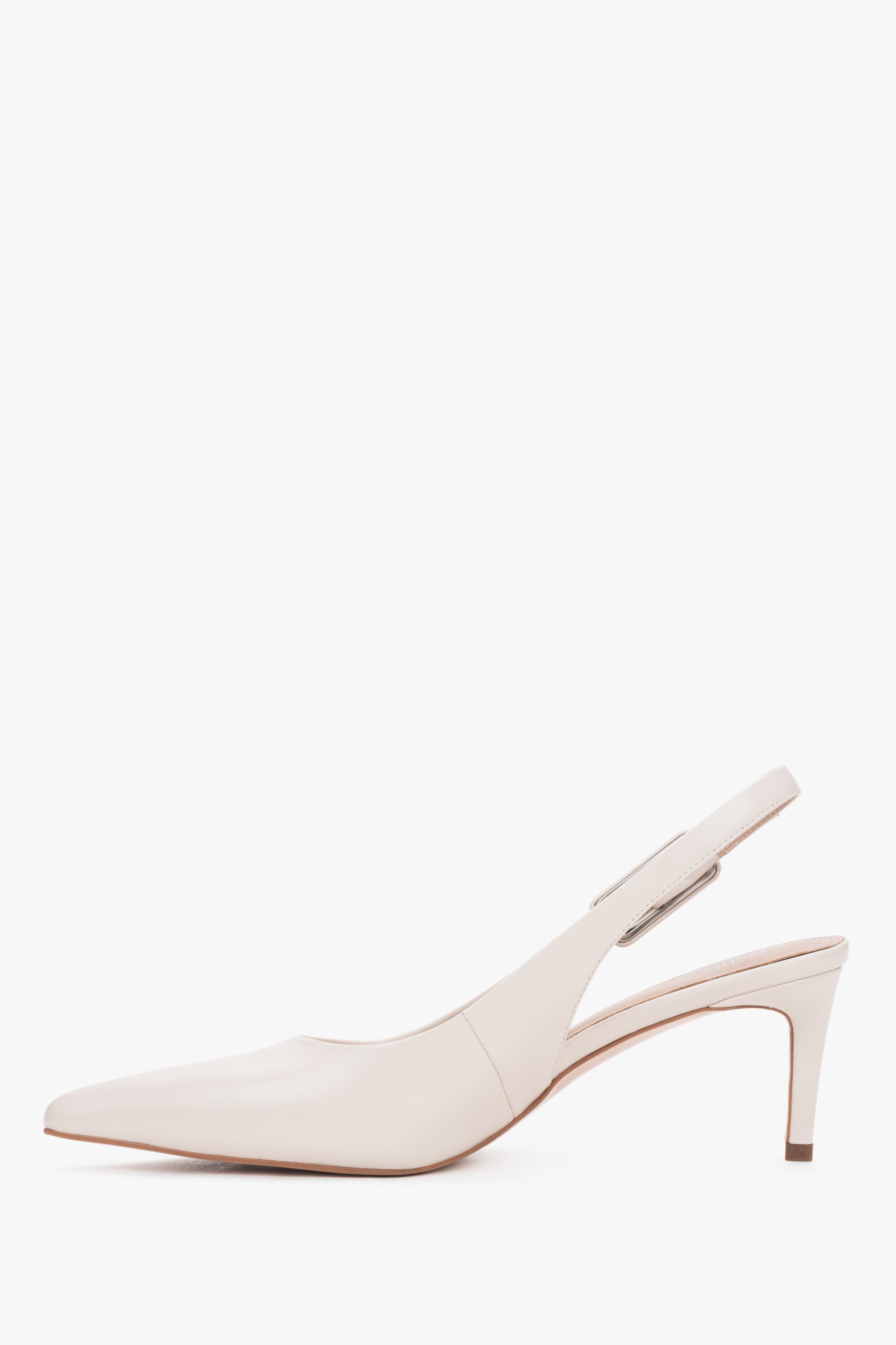 Elegant milky beige leather heels with a stable 6.5 cm stiletto and silver buckle.