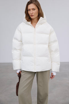 Milky beige women's loose-fit jacket with eco-friendly down filling by Estro.