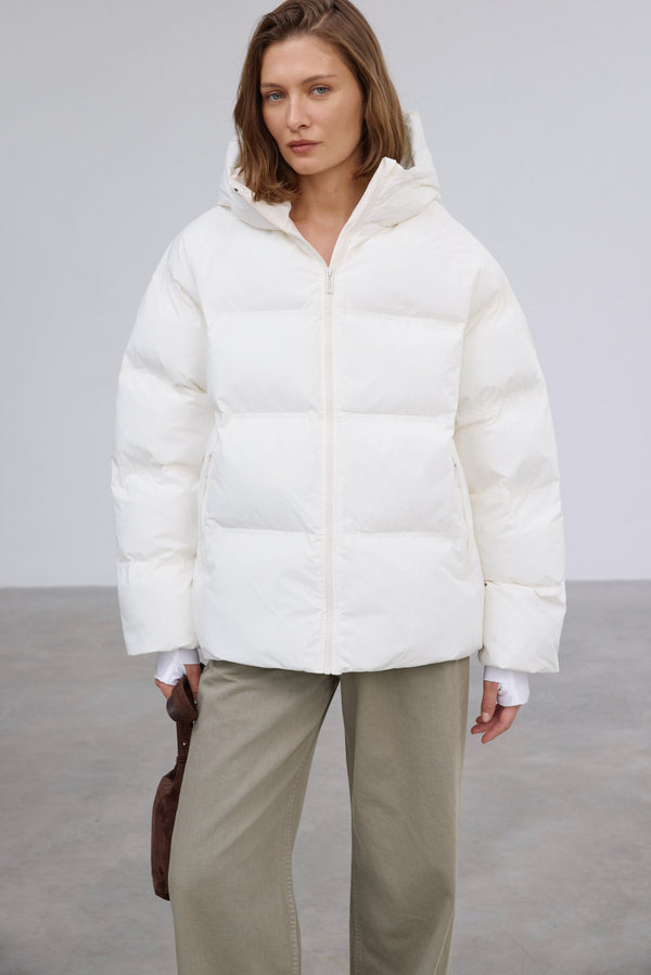 Milky beige women's loose-fit jacket with eco-friendly down filling by Estro.