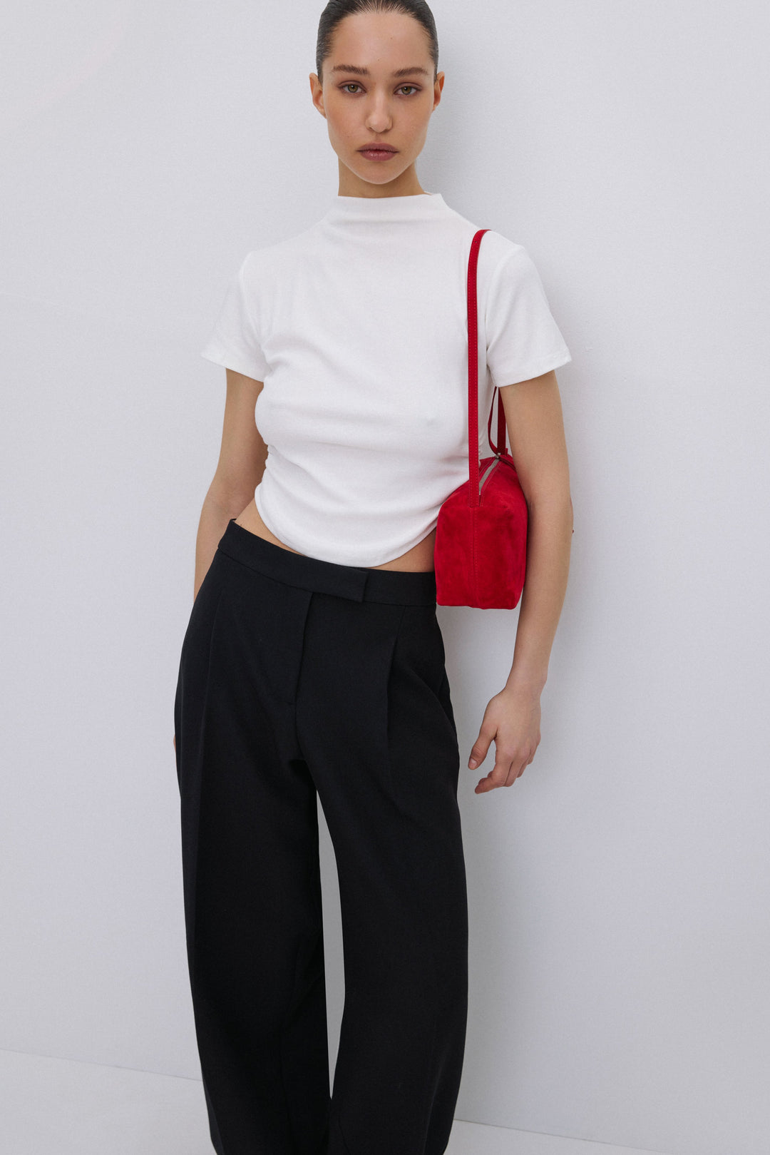 Milky beige women's T-shirt with ruched waist.