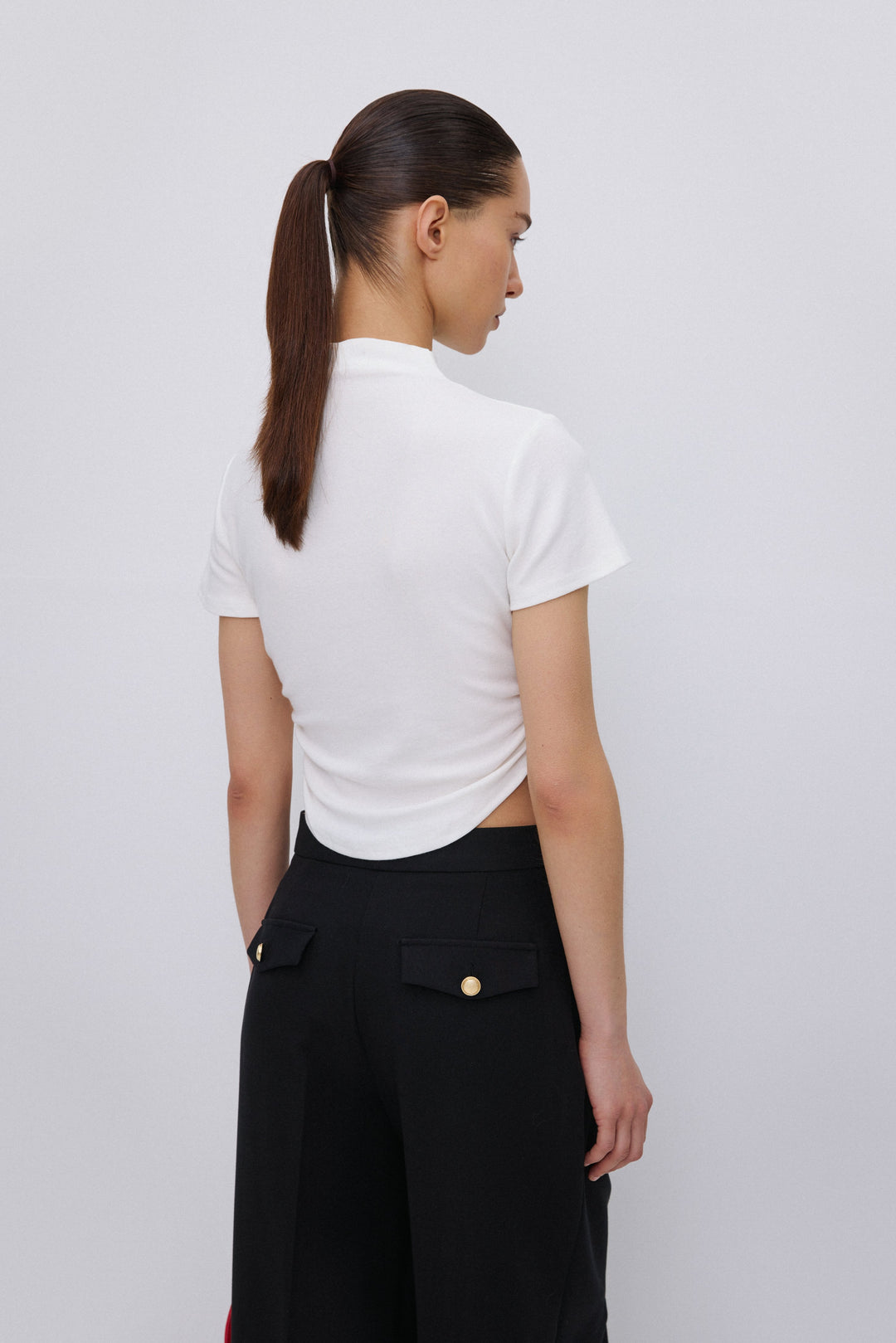 Back of women's milky beige soft cotton T-shirt.