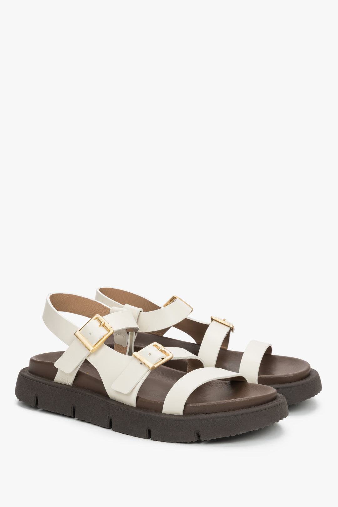 Beige women’s sandals made of genuine leather with flexible sole.