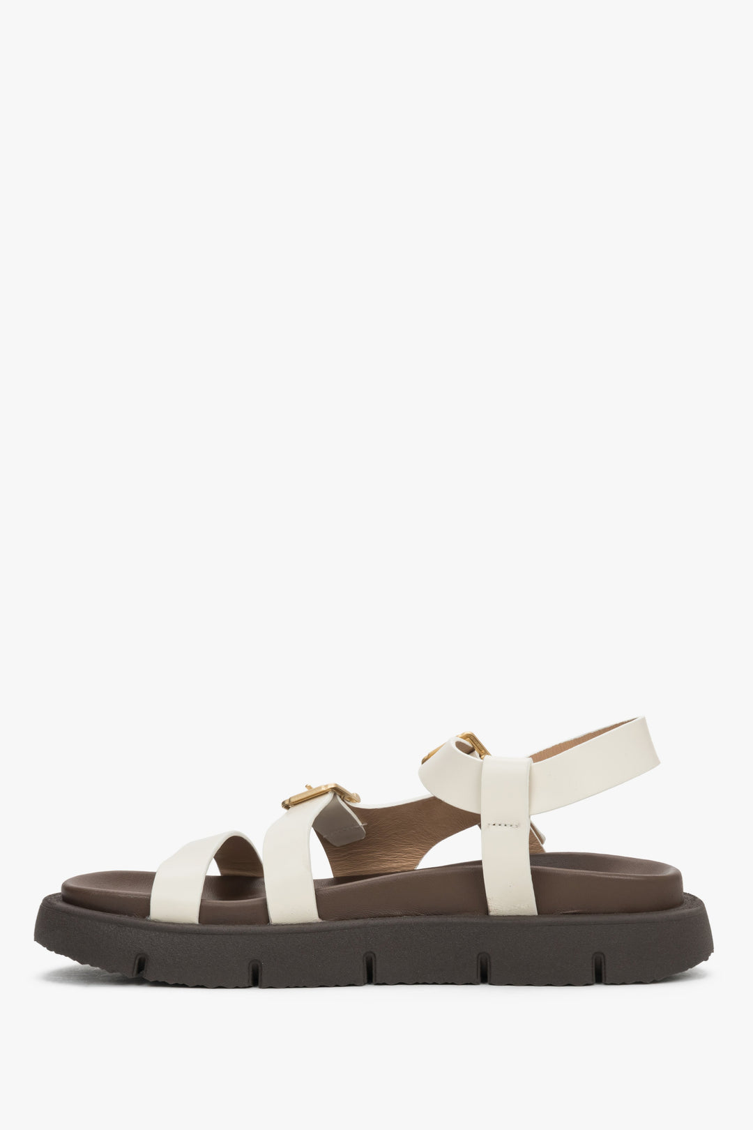 Women’s beige sandals on a flexible sole made of natural leather by Estro – side view.