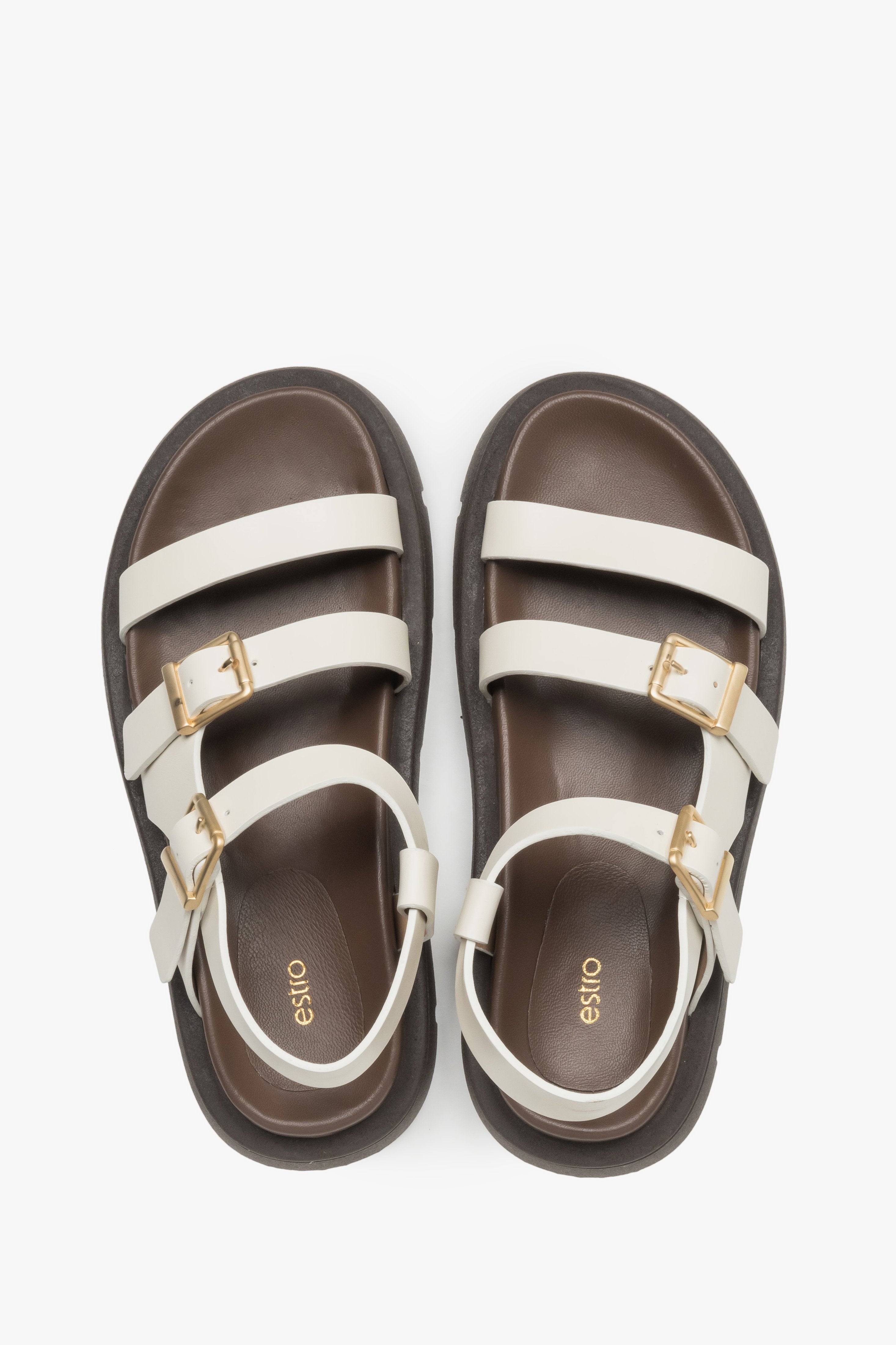 Women’s beige sandals made of genuine leather on a flexible sole by Estro – top view.