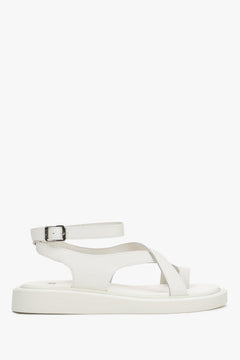 Milky white casual women’s leather sandals on a thick sole.