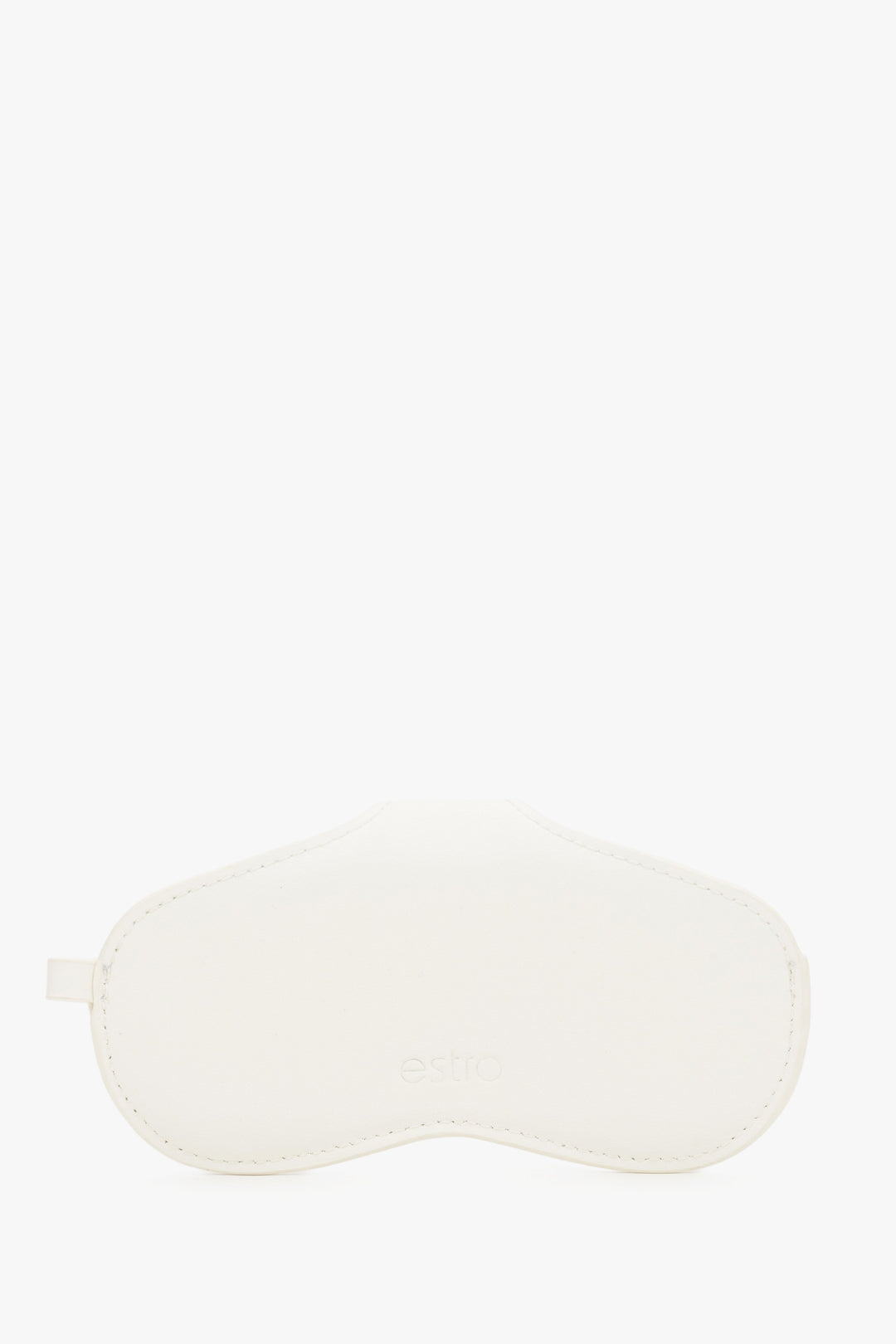 A side view emphasizing the slim, compact profile of the white case and its precise, tonal stitching.