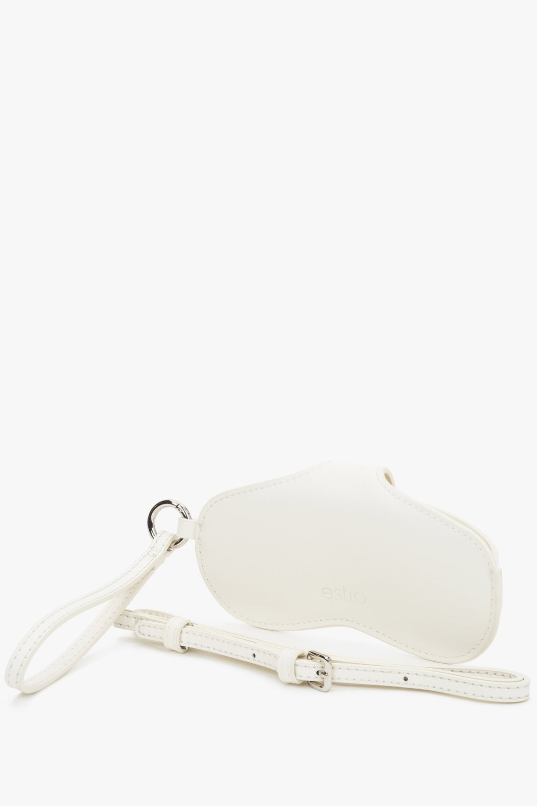 A close-up shot highlighting the adjustable leather strap and the cool brilliance of the silver-tone metal hardware against the creamy leather.