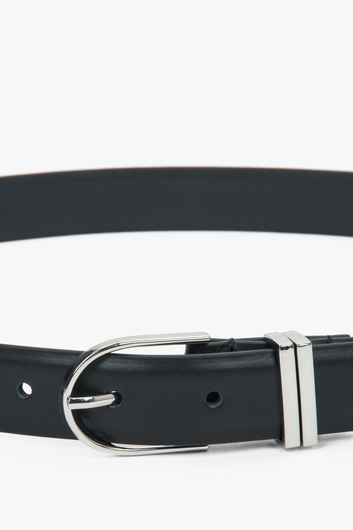 Minimalist black women’s belt made of genuine leather with silver-tone hardware.