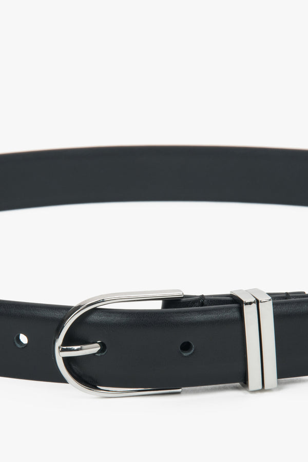 Minimalist black women’s belt made of genuine leather with silver-tone hardware.