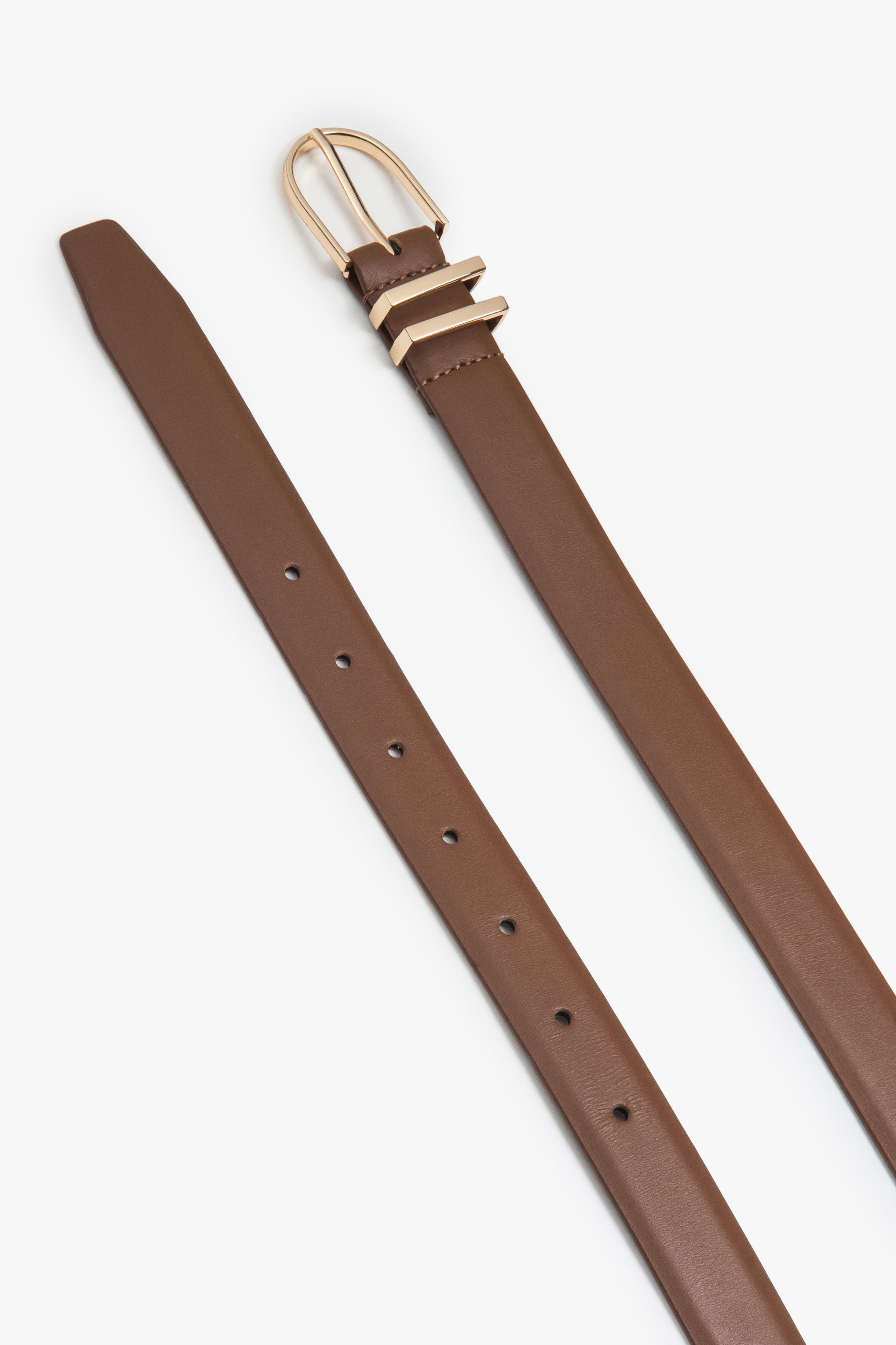 Minimalist light brown women’s belt made of genuine leather with gold-tone hardware.