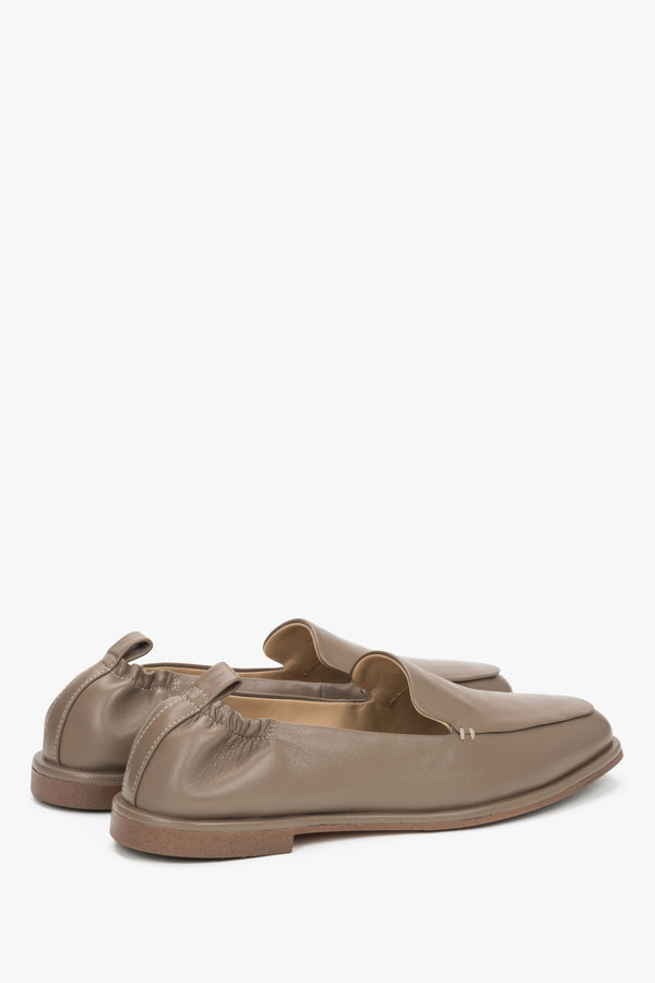 Angled view of women's olive green slip on loafers by Estro