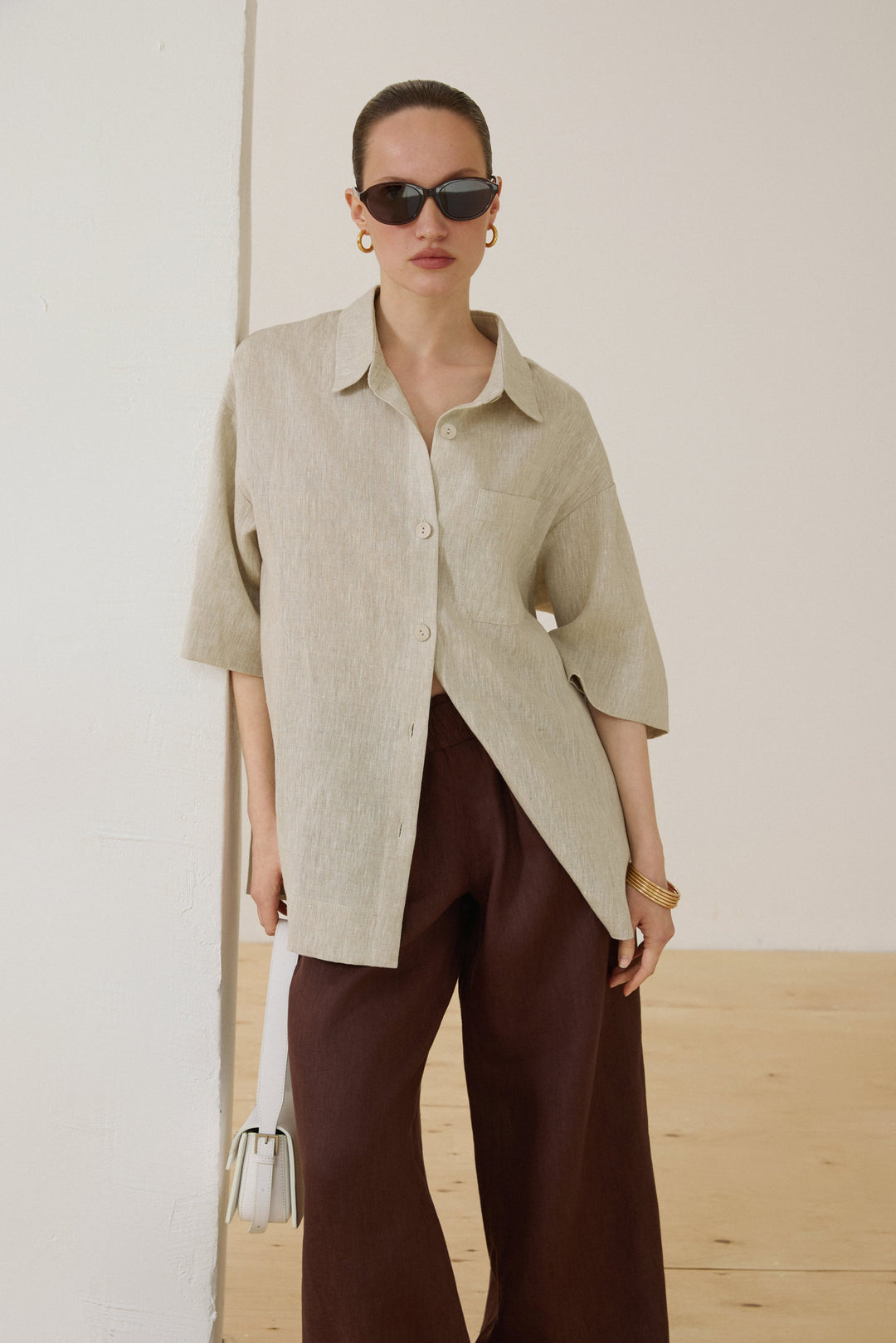 Oval Sunglasses With Brown Frames – Model Showcase.