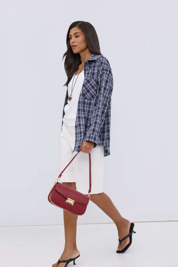 Button-up blue women's oversized plaid shirt, Estro.