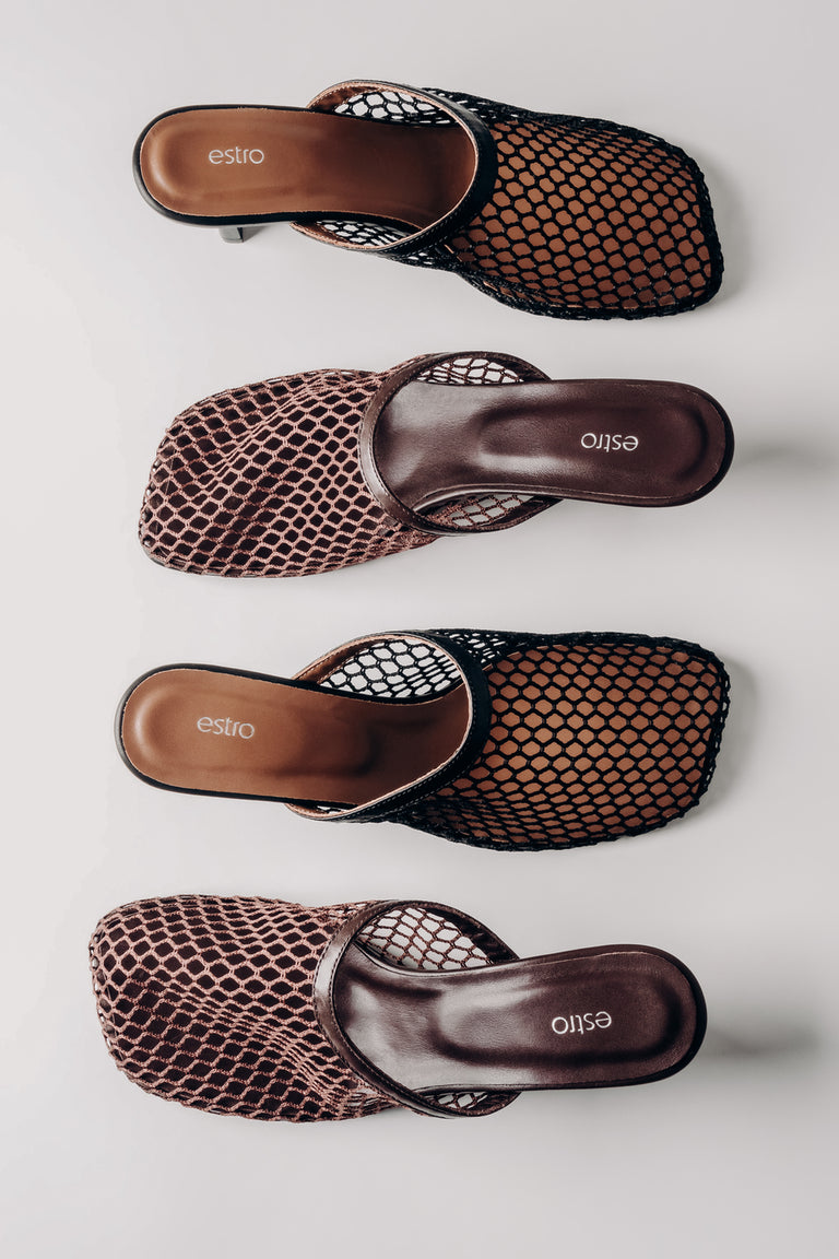 Four pairs of fishnet sandals with brown soles on a light gray background