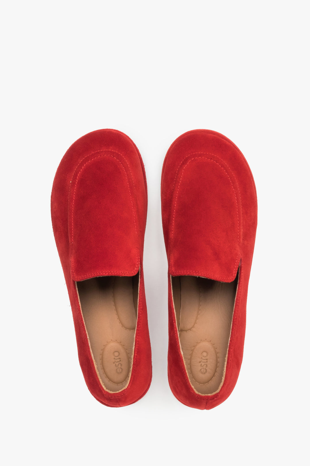 Top view of a pair of shoes showcasing a widened anatomical toe box, classic stitching on the toe cap, and a light leather insole.