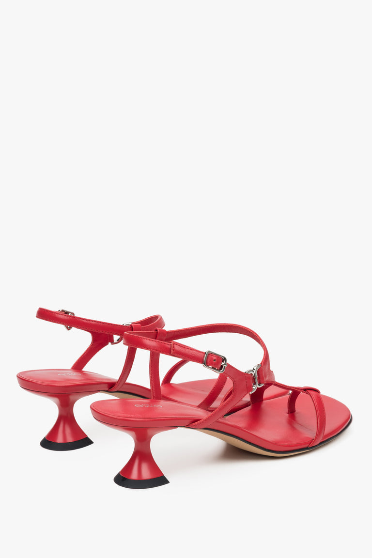 Made of woven straps, red women’s sandals with a funnel heel Estro.