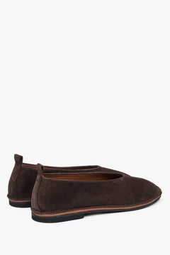 Classic saddle brown ballet flats for women, updated with a soft velour finish for a modern twist.