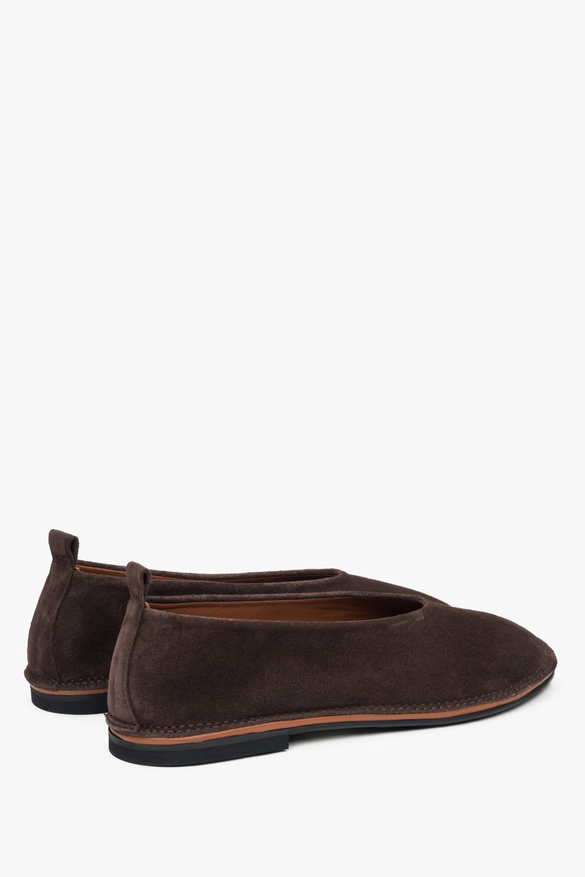 Classic saddle brown ballet flats for women, updated with a soft velour finish for a modern twist.