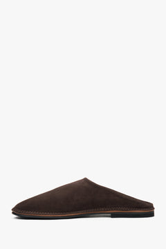 Chic women's mules by Estro, featuring a soft saddle brown velour upper for a refined look.