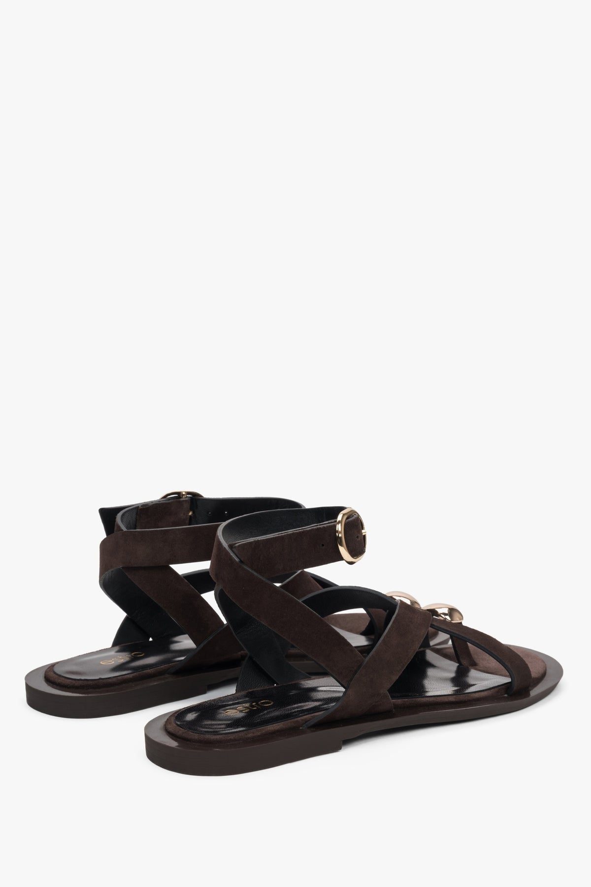 Saddle brown velour women's sandals by Estro, offering a unique and fashionable look with their strappy design and subtle toe ring. 