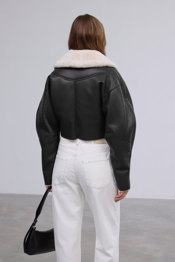 Short women's black shearling-style jacket, Estro brand.