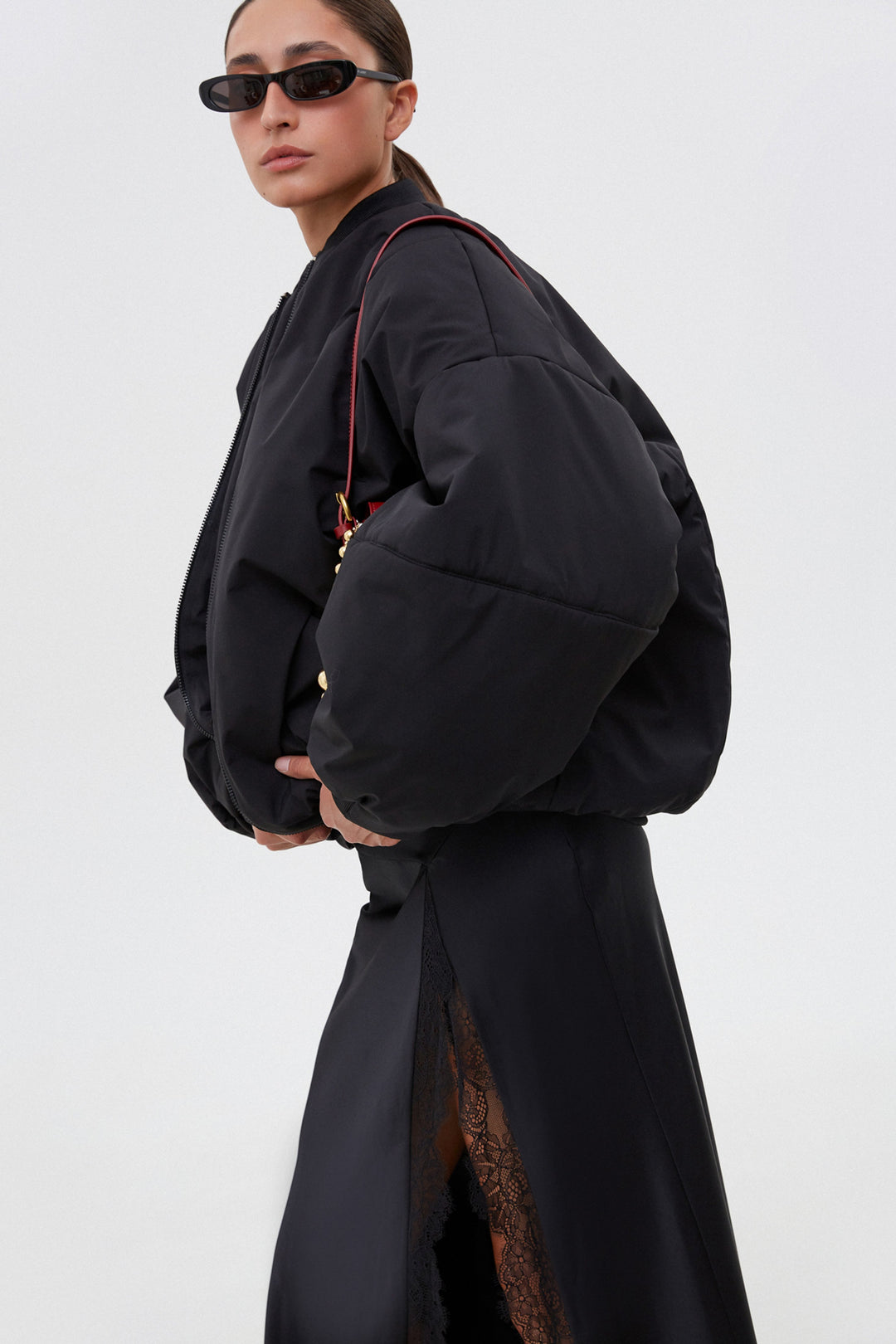 Women’s short black oversize bomber jacket with a stand collar, Estro.