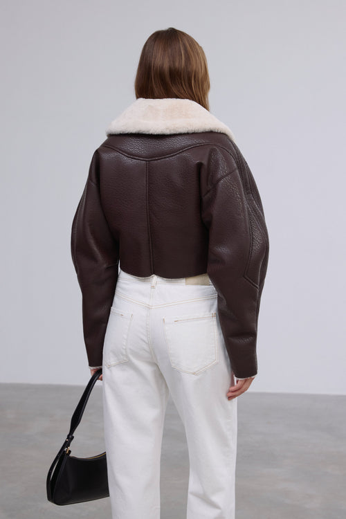 Short women's dark brown shearling-style jacket, Estro brand.
