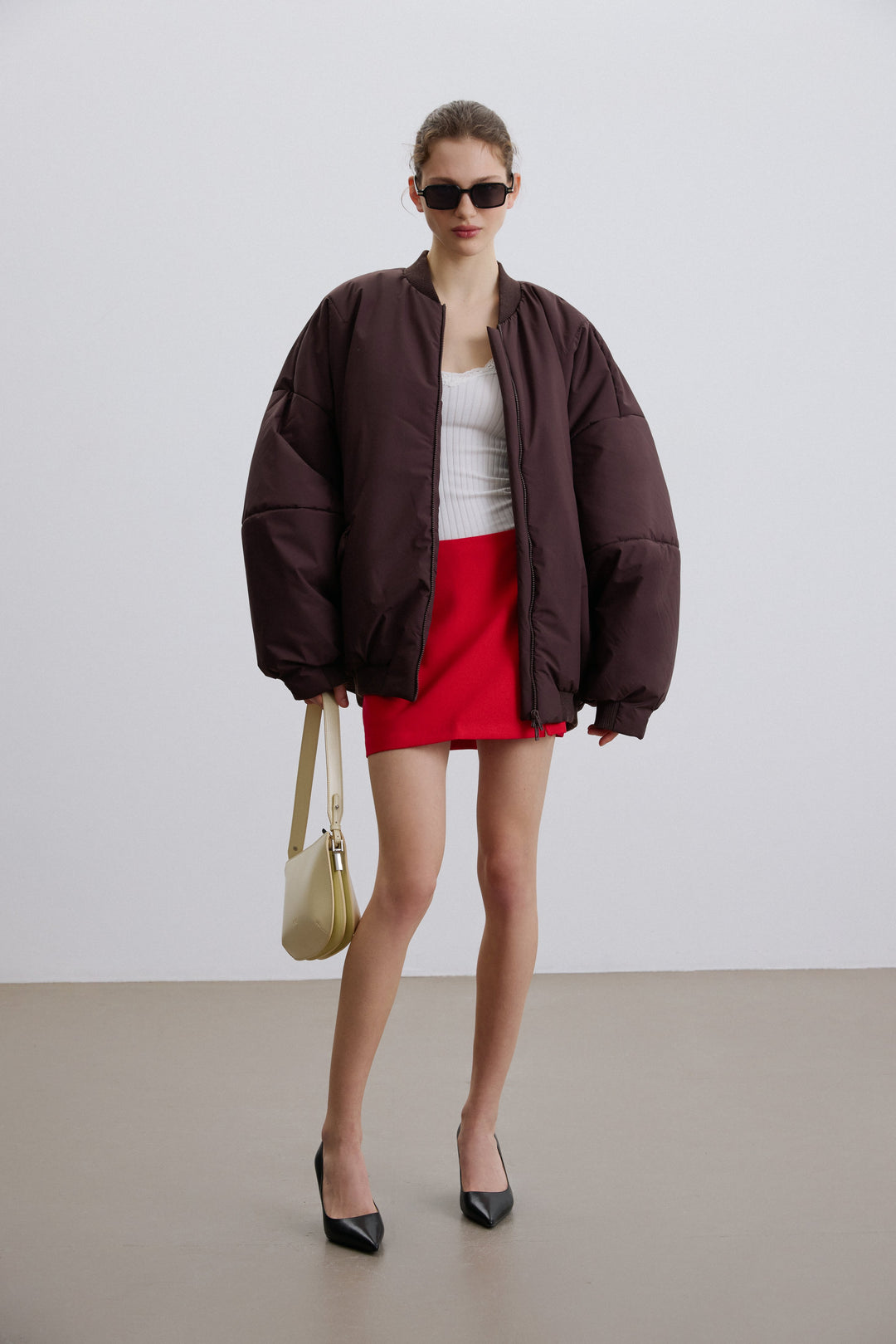 Back view highlighting the short, above-hip fit and minimalist design.