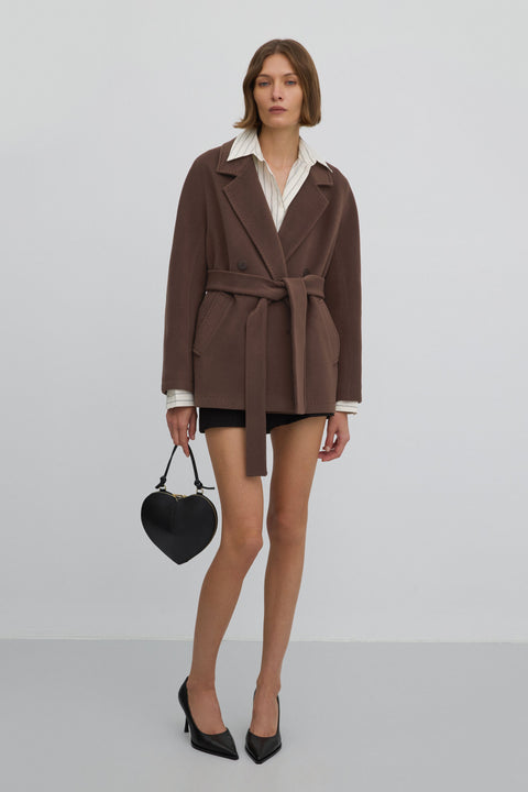 Double-breasted women’s wool coat in brown.