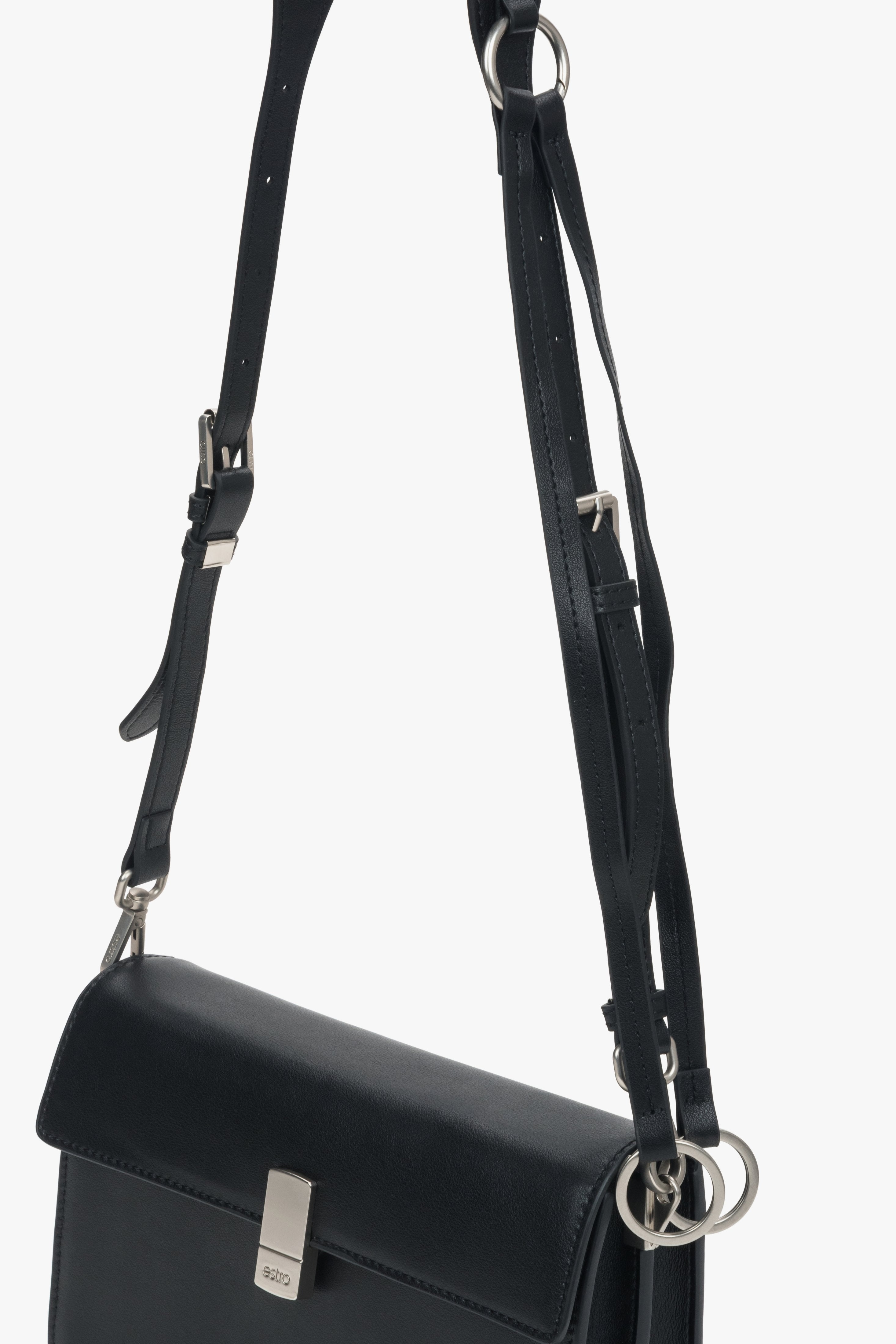 Compact women’s crossbody bag in black leather with silver hardware, Estro.