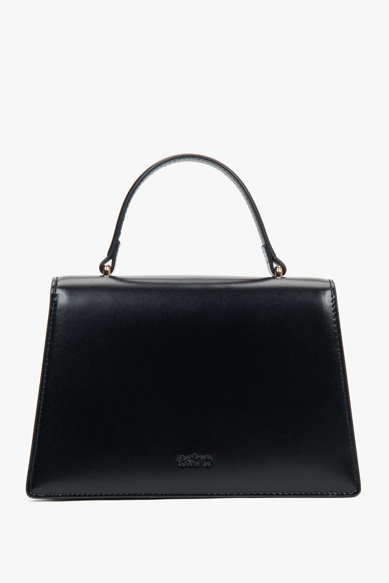 Small black women’s satchel handbag made of genuine leather.