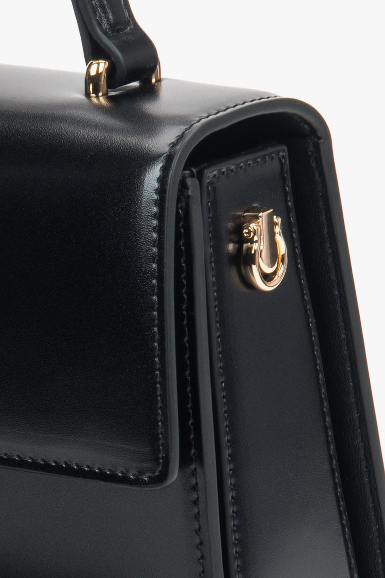Black small women’s satchel handbag from Estro crafted from genuine leather.