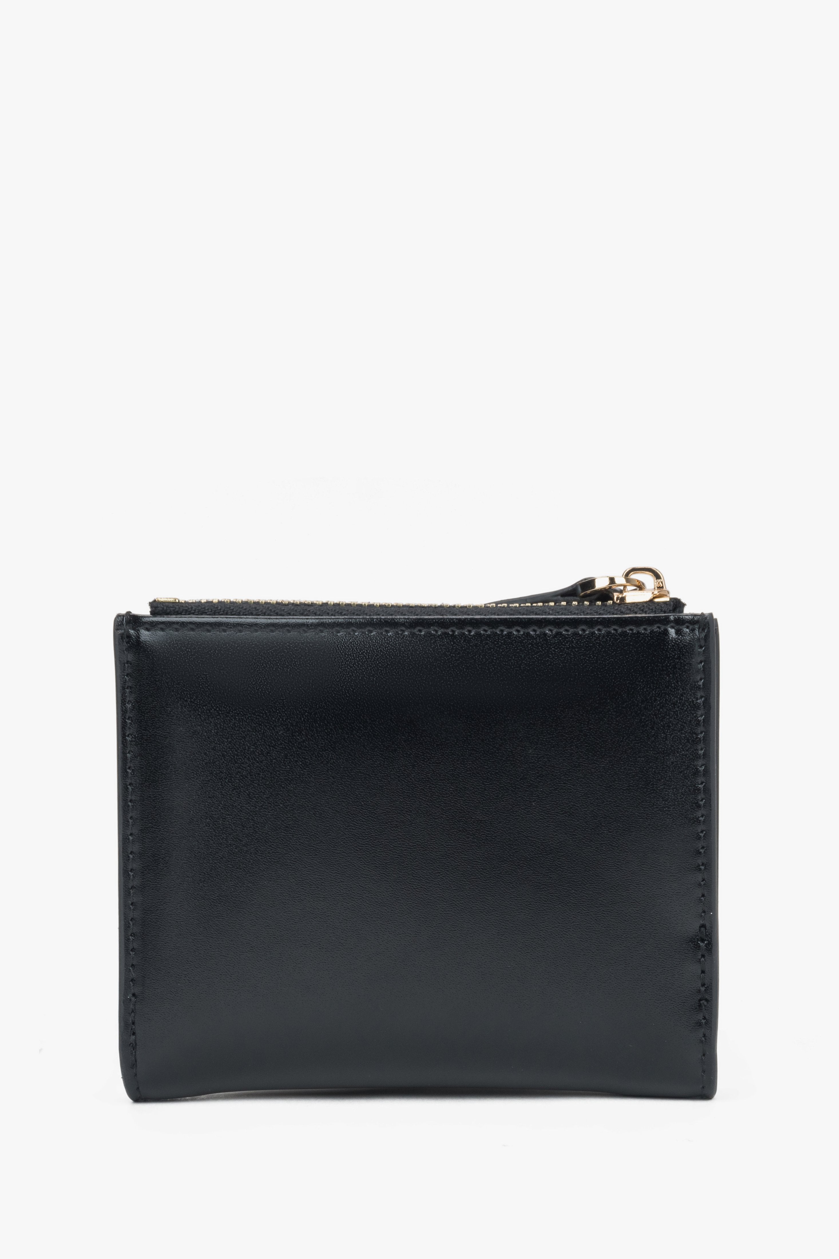 Small black women's wallet made of genuine leather.