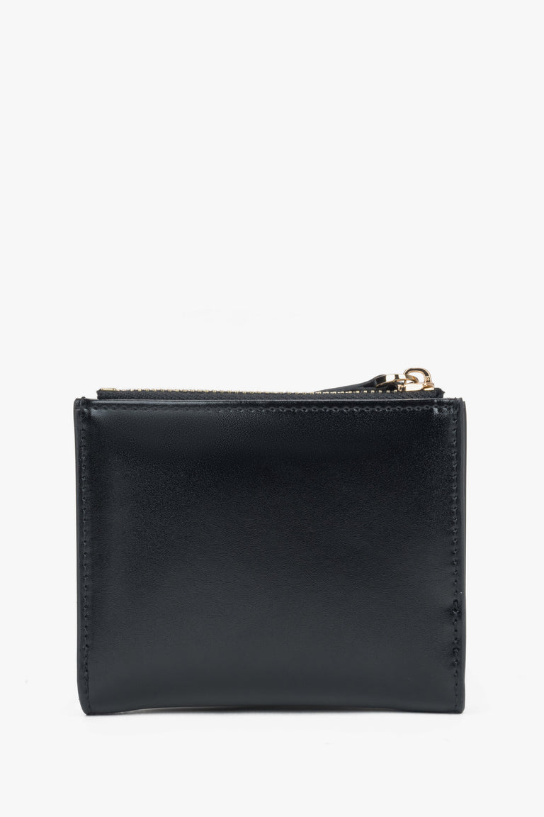 Small black women's wallet made of genuine leather.
