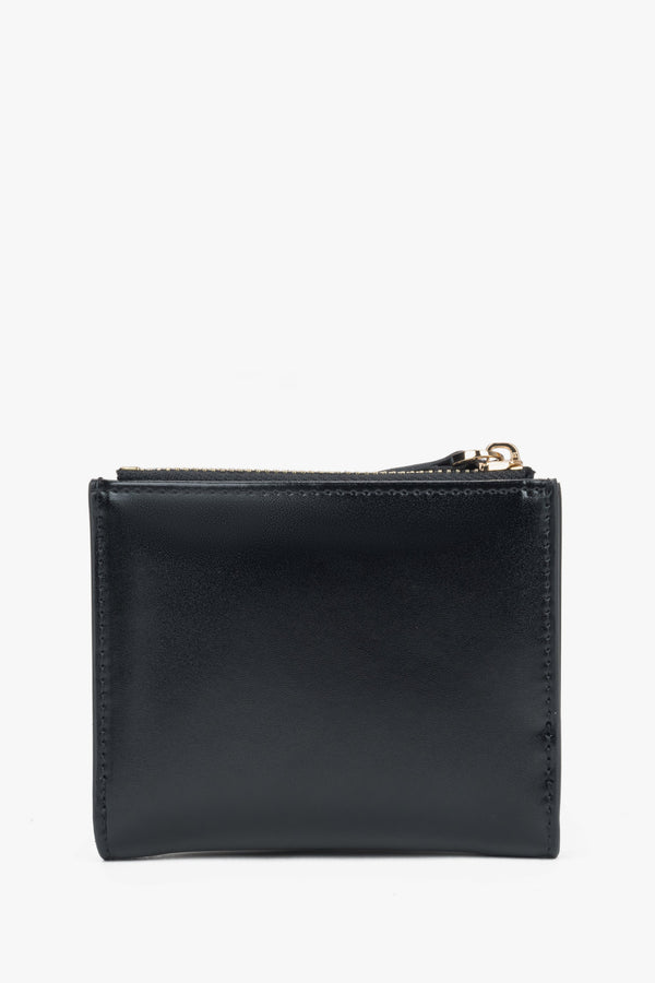 Small black women's wallet made of genuine leather.