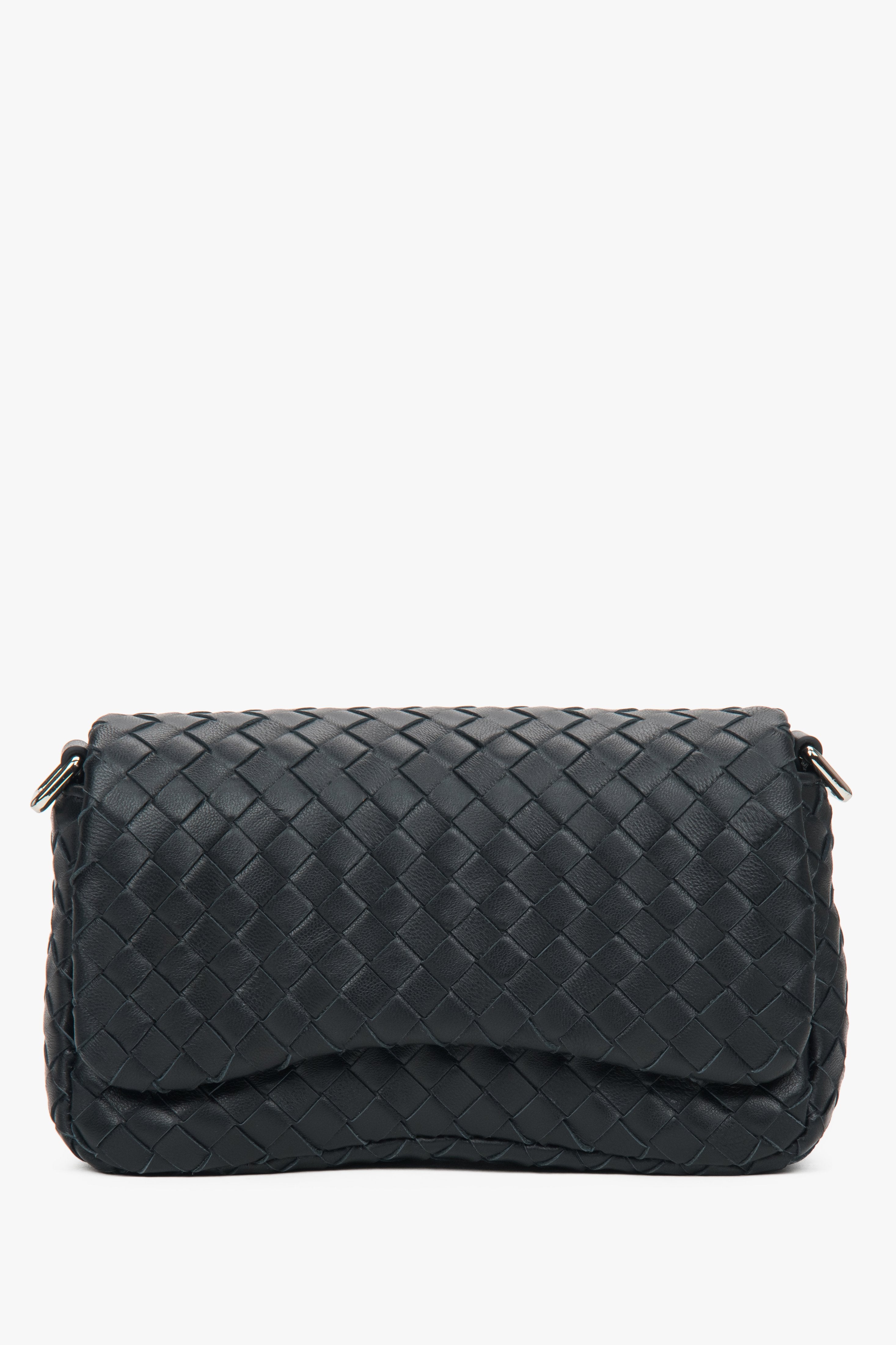 Small black women’s shoulder bag made of woven genuine leather.